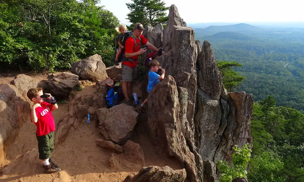 Family looking over Crowders Mountain 