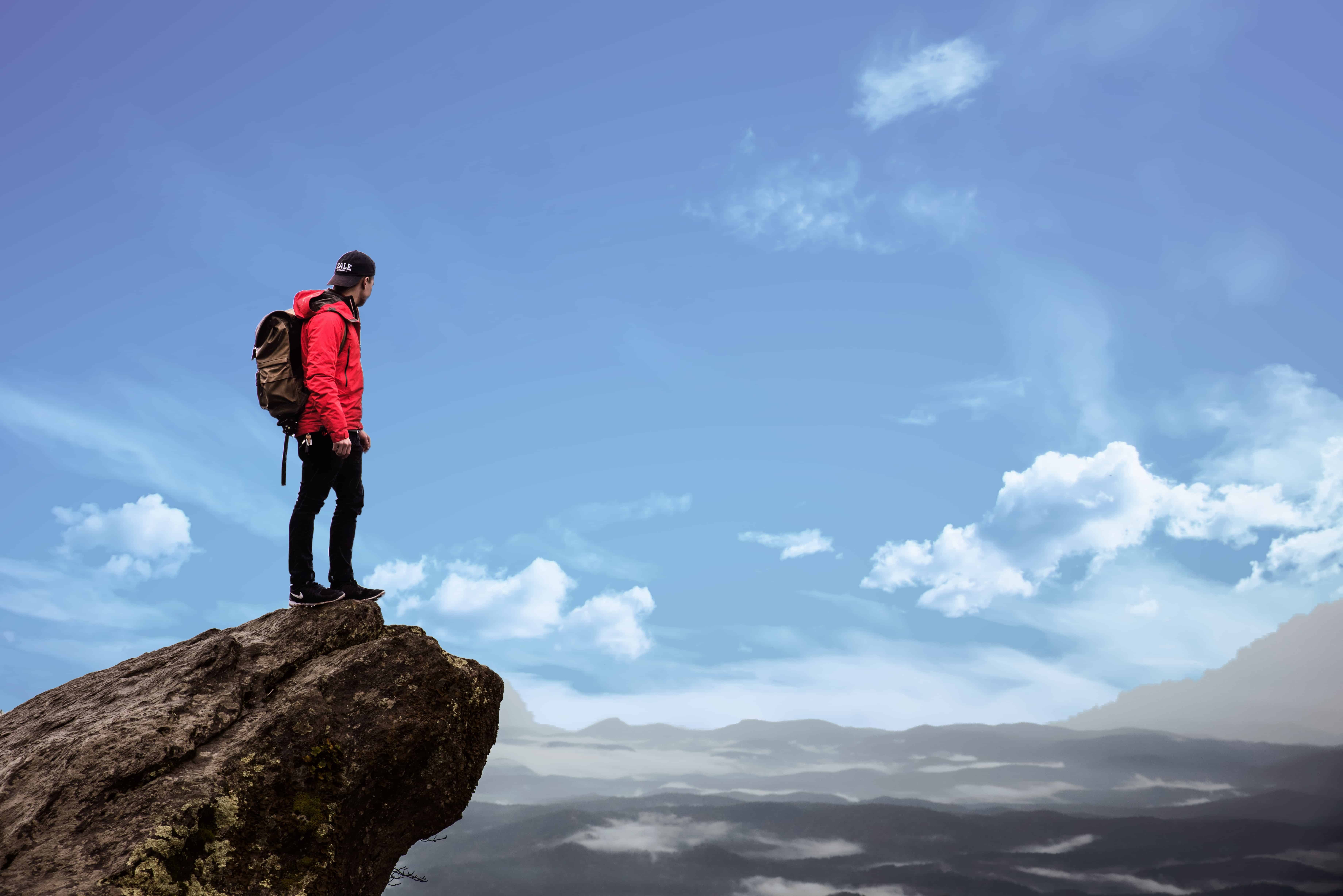 man standing on crowders mountain